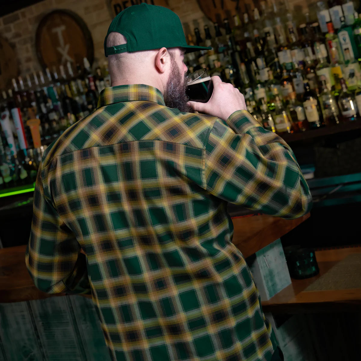 The Dubliner Men’s Flannel is more than just a shirt—it’s a tribute to the rich legacy of Guinness. Crafted with bold green and black tones, accented by fiery bright accents, this flannel channels the essence of Dublin’s iconic brew. Whether you’re raising a pint at the pub or just embracing the boldness of life, this flannel’s deep colors and premium craftsmanship will have you standing out, just like the Guinness stout that inspired it.