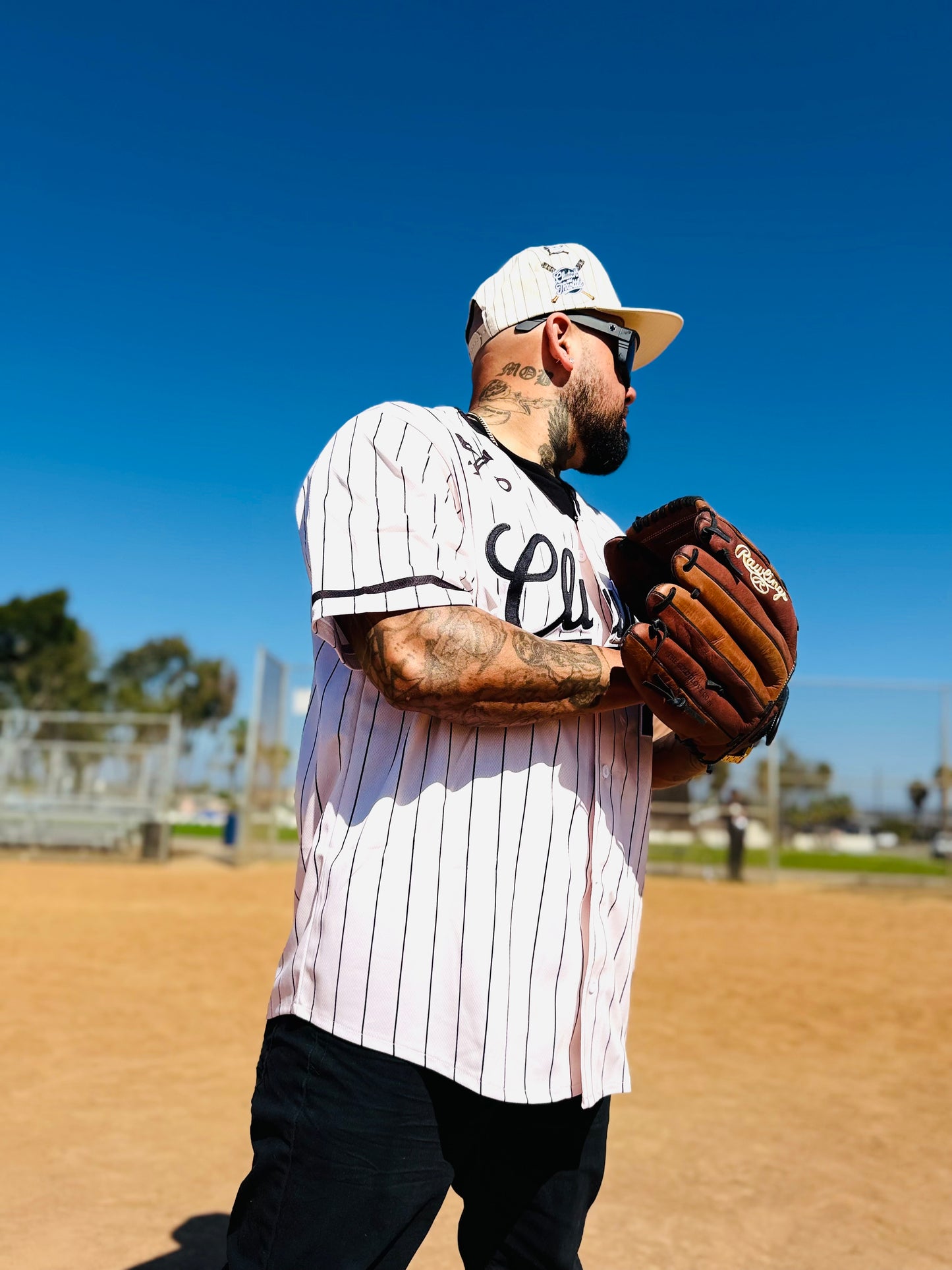 The OG Slugger Pinstriped Baseball Jersey (Off-White/Black)