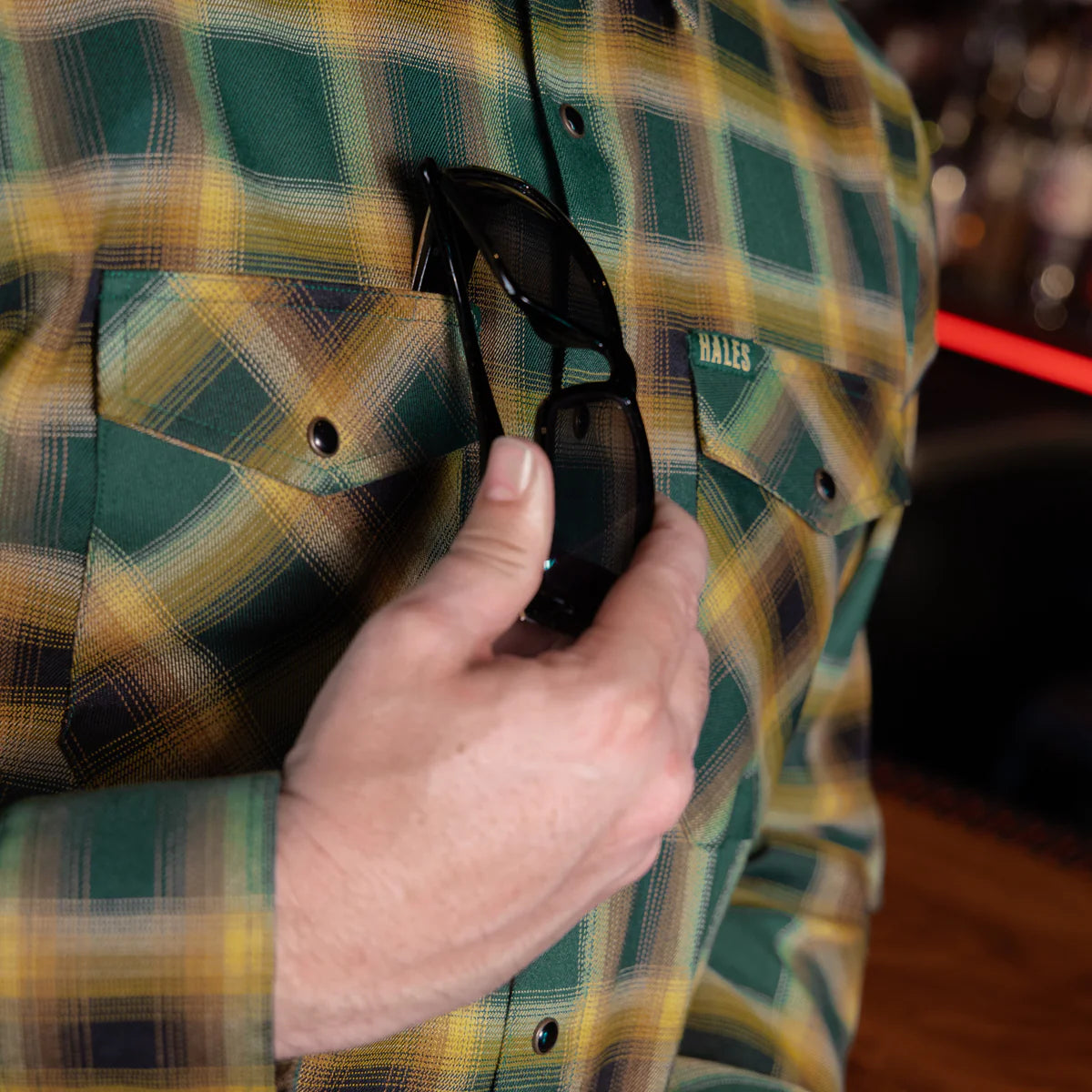 The Dubliner Men’s Flannel is more than just a shirt—it’s a tribute to the rich legacy of Guinness. Crafted with bold green and black tones, accented by fiery bright accents, this flannel channels the essence of Dublin’s iconic brew. Whether you’re raising a pint at the pub or just embracing the boldness of life, this flannel’s deep colors and premium craftsmanship will have you standing out, just like the Guinness stout that inspired it.