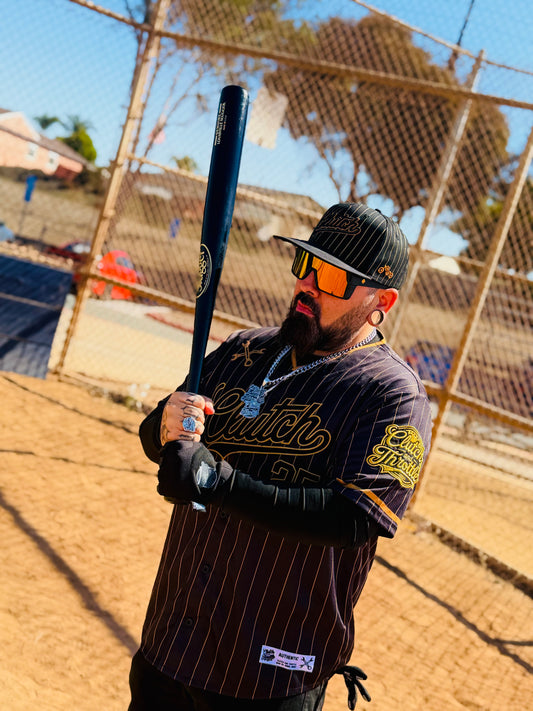 The OG Slugger Pinstriped Baseball Jersey (Black/Gold)