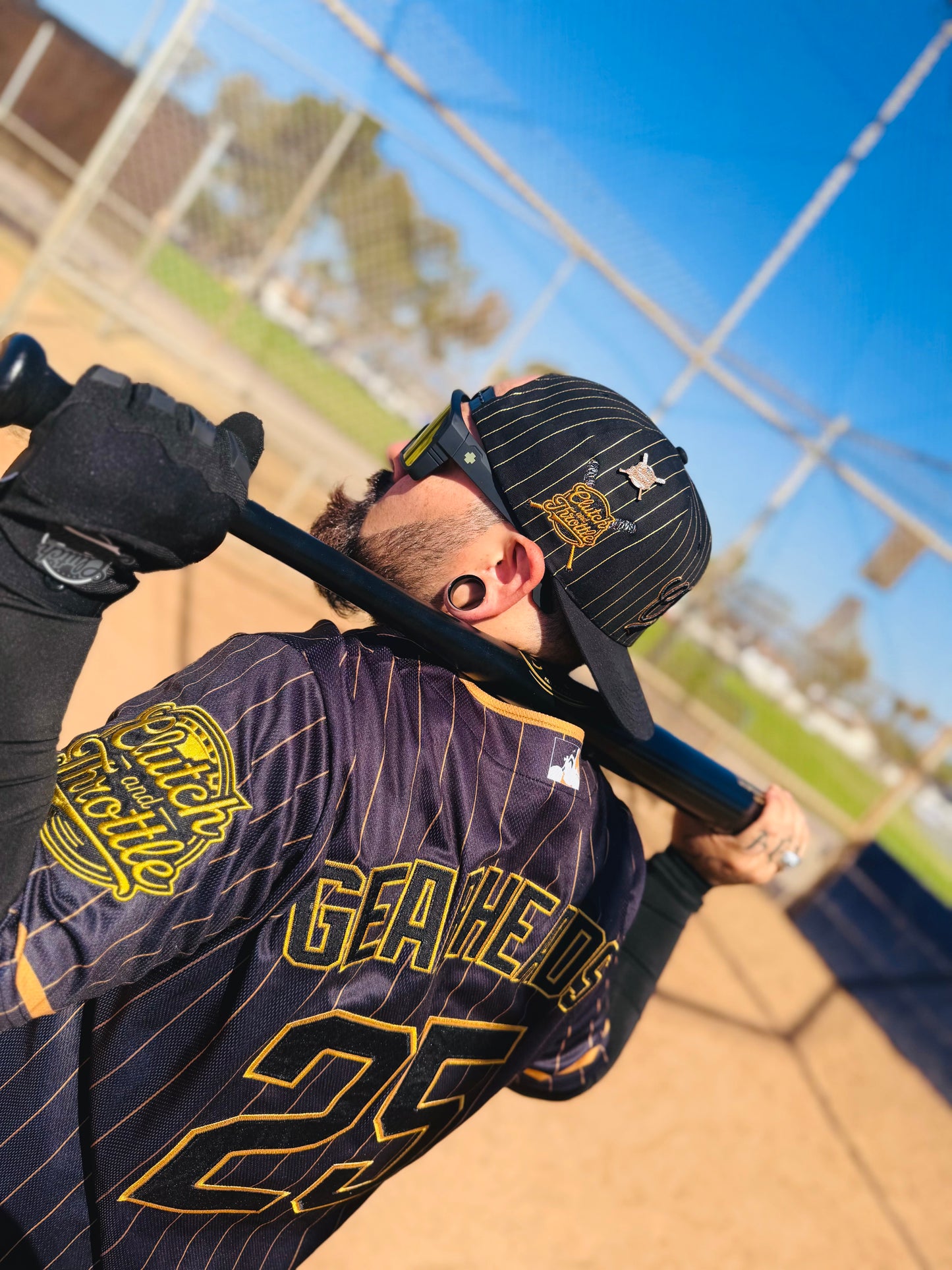 The OG Slugger Pinstriped Baseball Jersey (Black/Gold)
