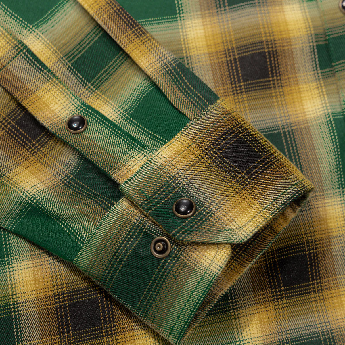 The Dubliner Men’s Flannel is more than just a shirt—it’s a tribute to the rich legacy of Guinness. Crafted with bold green and black tones, accented by fiery bright accents, this flannel channels the essence of Dublin’s iconic brew. Whether you’re raising a pint at the pub or just embracing the boldness of life, this flannel’s deep colors and premium craftsmanship will have you standing out, just like the Guinness stout that inspired it.
