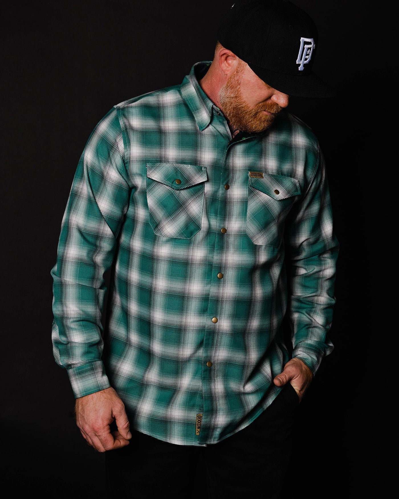 Cheers to the nights you won't remember. The Russell Flannel features an allover green, white, and black plaid pattern that offers a clean and classic design, while our signature D-Tech™ blend provides the comfort of soft to the touch flannel. Constructed to be breathable for the performance you demand, yet durable for the rugged lifestyle you live.
