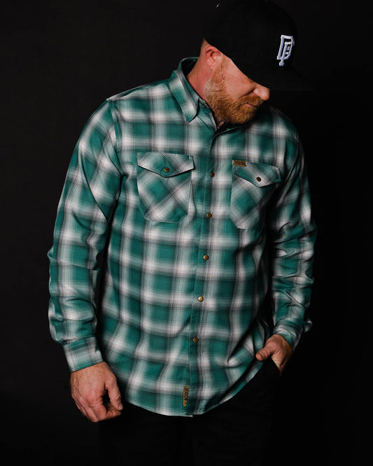 Cheers to the nights you won't remember. The Russell Flannel features an allover green, white, and black plaid pattern that offers a clean and classic design, while our signature D-Tech™ blend provides the comfort of soft to the touch flannel. Constructed to be breathable for the performance you demand, yet durable for the rugged lifestyle you live.