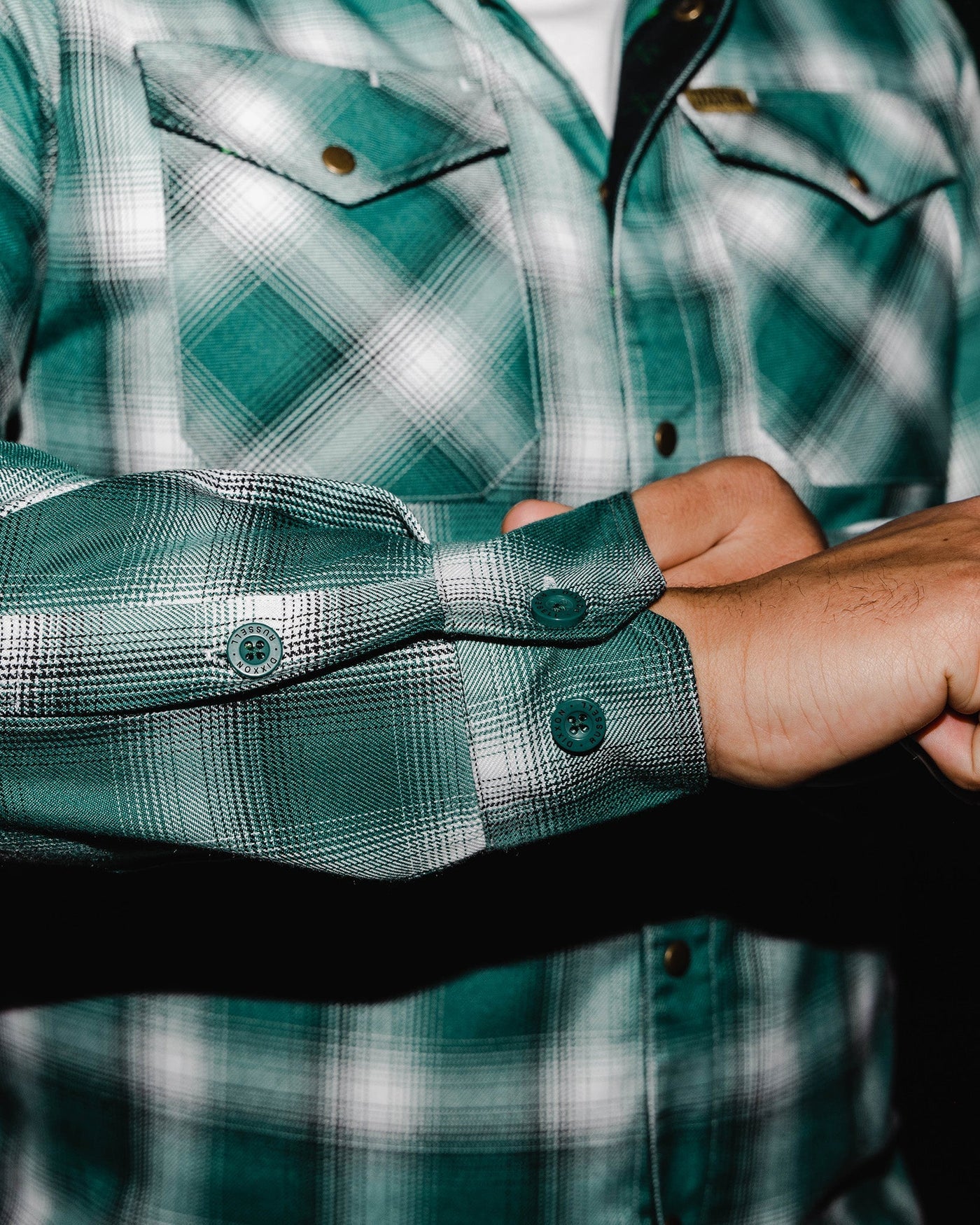 Cheers to the nights you won't remember. The Russell Flannel features an allover green, white, and black plaid pattern that offers a clean and classic design, while our signature D-Tech™ blend provides the comfort of soft to the touch flannel. Constructed to be breathable for the performance you demand, yet durable for the rugged lifestyle you live.