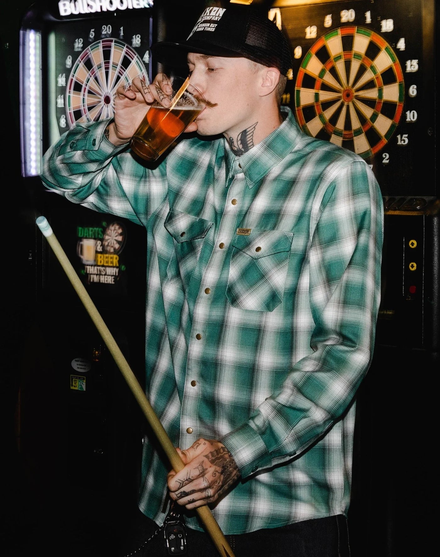 Cheers to the nights you won't remember. The Russell Flannel features an allover green, white, and black plaid pattern that offers a clean and classic design, while our signature D-Tech™ blend provides the comfort of soft to the touch flannel. Constructed to be breathable for the performance you demand, yet durable for the rugged lifestyle you live.