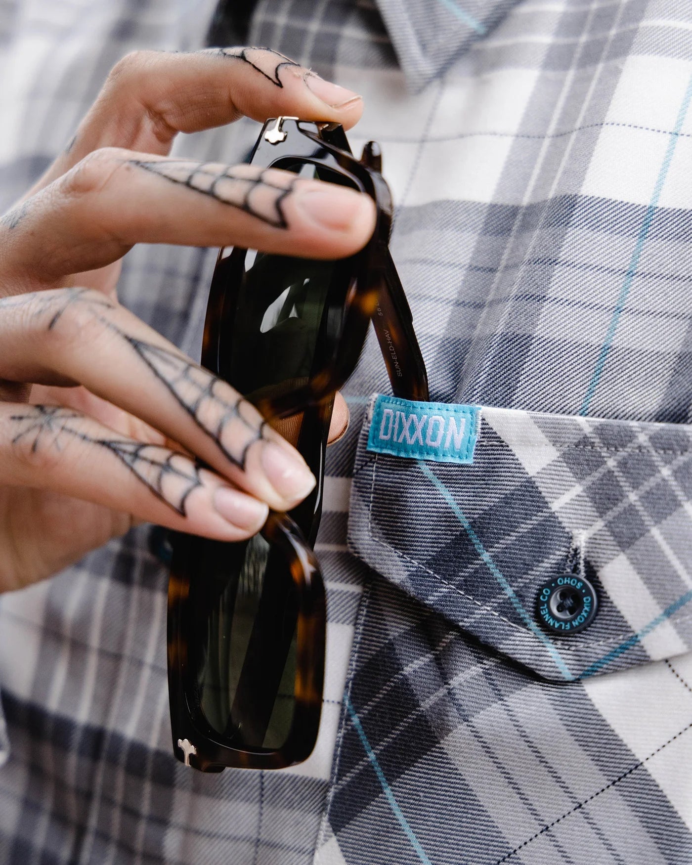 Inspired by the hustle and bustle of the big city, the Soho Flannel features an allover gray, white, and aqua blue plaid pattern that offers a clean and classic design, while our signature D-Tech™ blend provides the comfort of soft to the touch flannel. Constructed to be breathable for the performance you demand, yet durable for the rugged lifestyle you live.