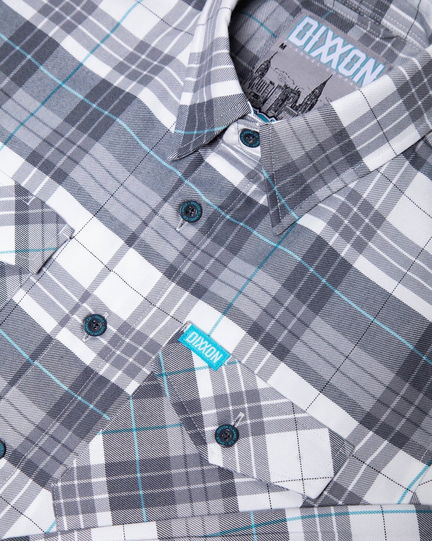 Inspired by the hustle and bustle of the big city, the Soho Flannel features an allover gray, white, and aqua blue plaid pattern that offers a clean and classic design, while our signature D-Tech™ blend provides the comfort of soft to the touch flannel. Constructed to be breathable for the performance you demand, yet durable for the rugged lifestyle you live.