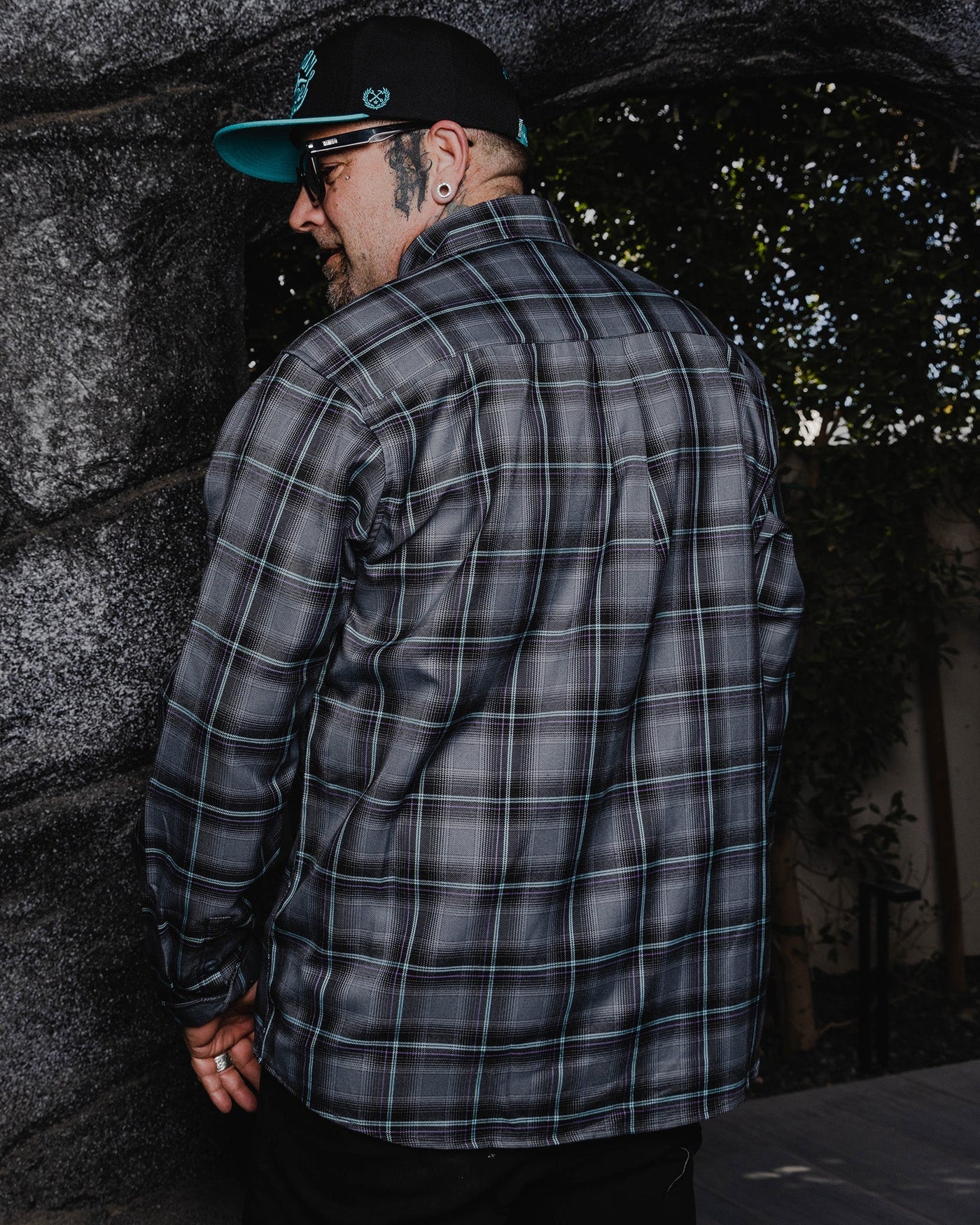 The FIFTH Flannel of the 6 Part Dancun Series, The Grotto Flannel features an allover black, gray, aqua blue, and purple plaid pattern that offers a clean and classic design, while our signature D-Tech™ blend provides the comfort of soft to the touch flannel. Constructed to be breathable for the performance you demand, yet durable for the rugged lifestyle you live.