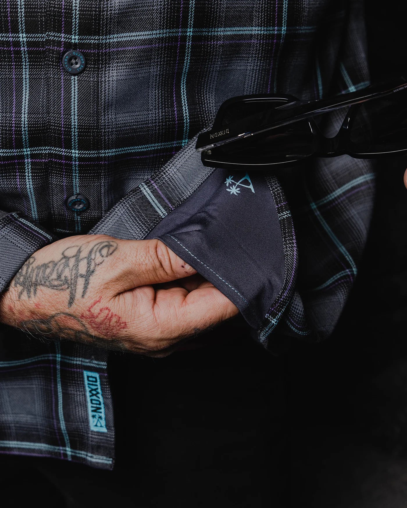 The FIFTH Flannel of the 6 Part Dancun Series, The Grotto Flannel features an allover black, gray, aqua blue, and purple plaid pattern that offers a clean and classic design, while our signature D-Tech™ blend provides the comfort of soft to the touch flannel. Constructed to be breathable for the performance you demand, yet durable for the rugged lifestyle you live.