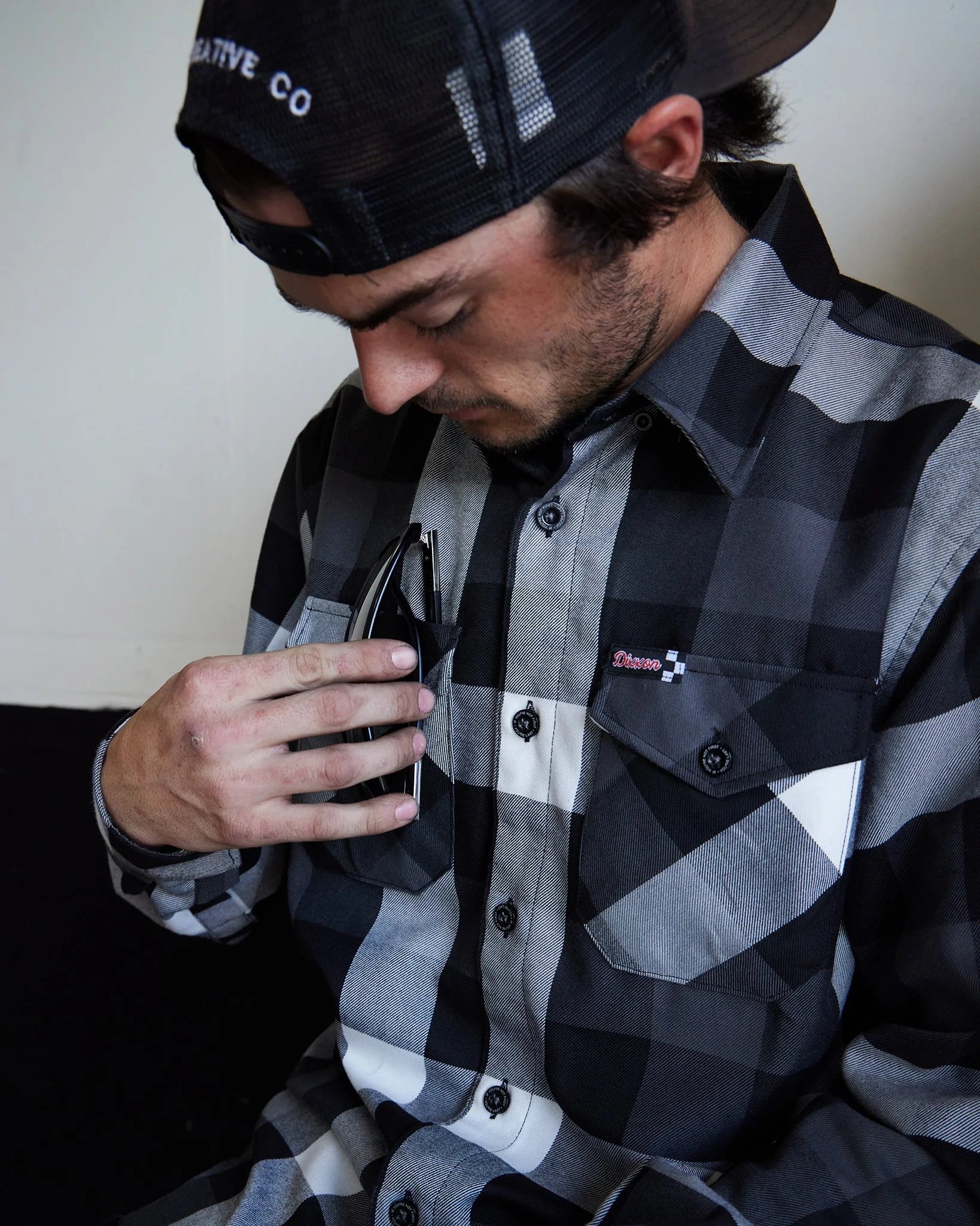 The Finish Line Flannel for Men.
Additional Info:
Men’s grey, white, and black plaid patterned flannel shirt
Machine wash cold with like colors
Hang to dry or tumble dry on low
Do not iron
Signature D-Tech™ polyester blend
Imported
