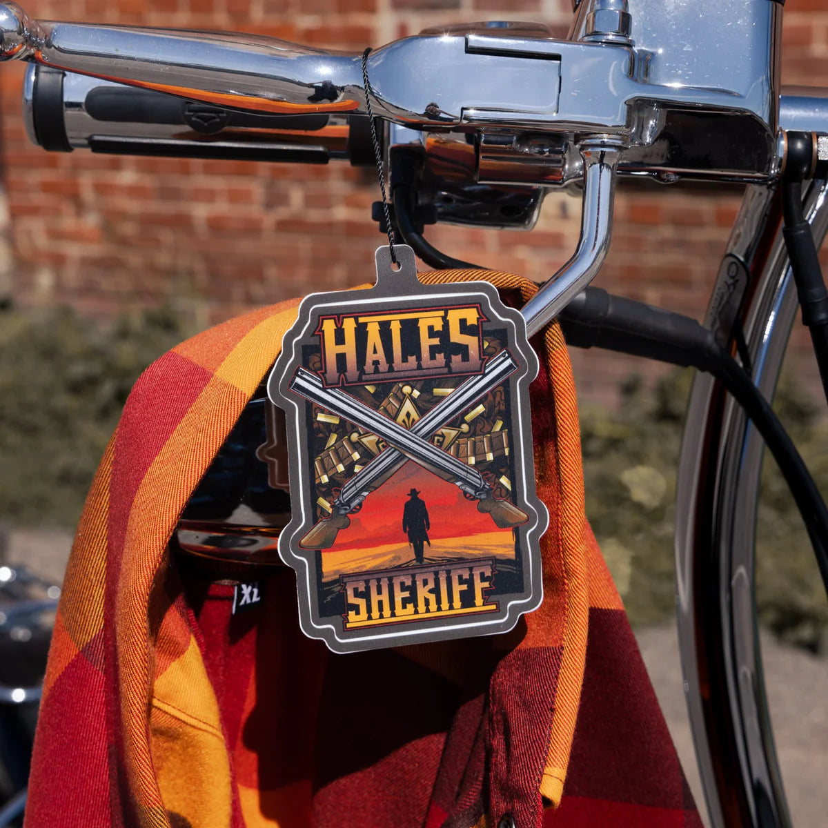 Worn by lawmen, cowboys, and outlaws alike, our "Sheriff" flannel guarantees a stylish and sharp look that will outlast your day! This long-sleeve pearl snap shirt features a timeless plaid pattern and the same unbeatable comfort of Hales Legendary Flannels that you already know and love. With a modern twist on a traditional western shirt, it boasts vibrant colors and our exclusive poly/spandex blend for ultimate comfort, making it an essential for any contemporary cowboy. The vibrant golden pearl snaps