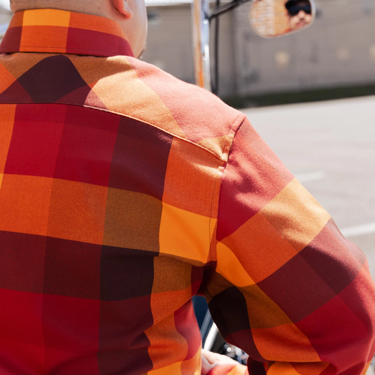 Worn by lawmen, cowboys, and outlaws alike, our "Sheriff" flannel guarantees a stylish and sharp look that will outlast your day! This long-sleeve pearl snap shirt features a timeless plaid pattern and the same unbeatable comfort of Hales Legendary Flannels that you already know and love. With a modern twist on a traditional western shirt, it boasts vibrant colors and our exclusive poly/spandex blend for ultimate comfort, making it an essential for any contemporary cowboy. The vibrant golden pearl snaps