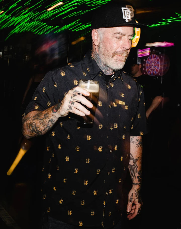 Add some Irish vibes to an everyday essential with the Scuttered Short Sleeve. Constructed with an easy fluid fabric, this button up party shirt was designed for a comfortable and laid-back wear. Soft and lightweight with a shrink and wrinkle resistant finish, the Scuttered is a must-have for anyone looking to have a good time!