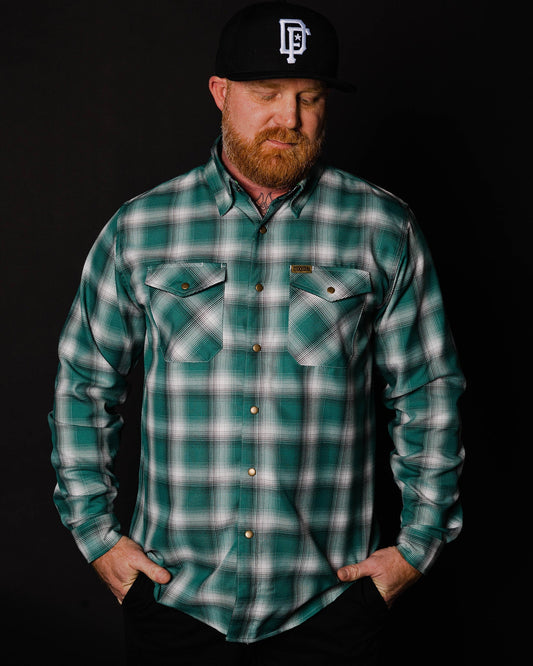 Cheers to the nights you won't remember. The Russell Flannel features an allover green, white, and black plaid pattern that offers a clean and classic design, while our signature D-Tech™ blend provides the comfort of soft to the touch flannel. Constructed to be breathable for the performance you demand, yet durable for the rugged lifestyle you live.