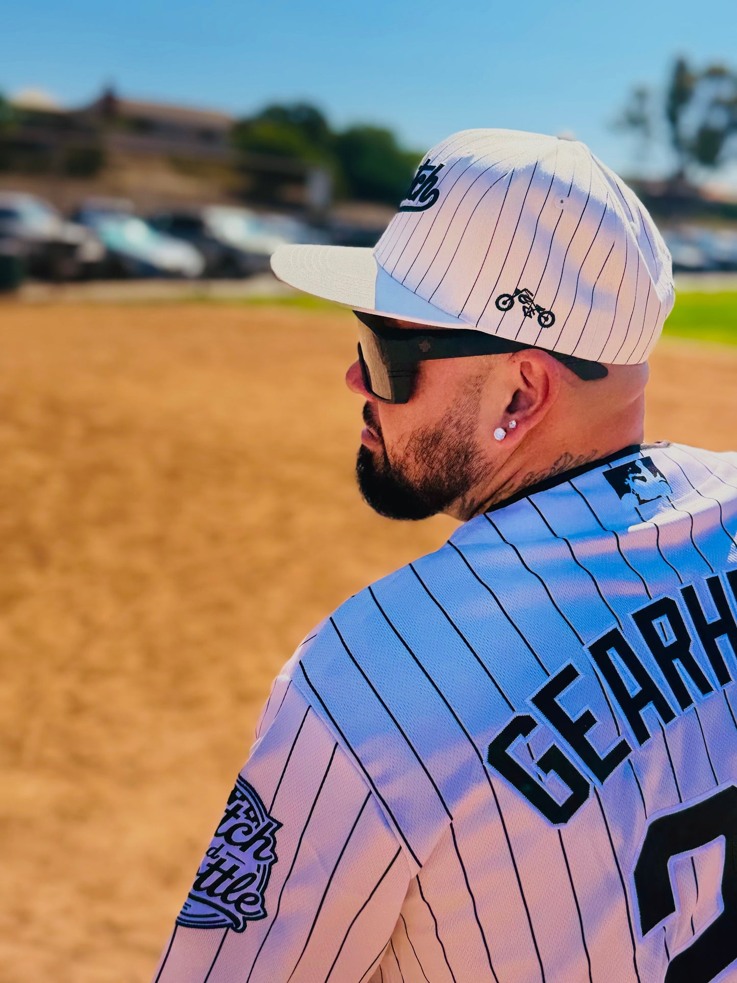 The OG Slugger Pinstriped Baseball Jersey (Off-White/Black)