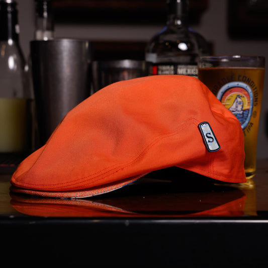 Villa Margarita Orange Flat Cap