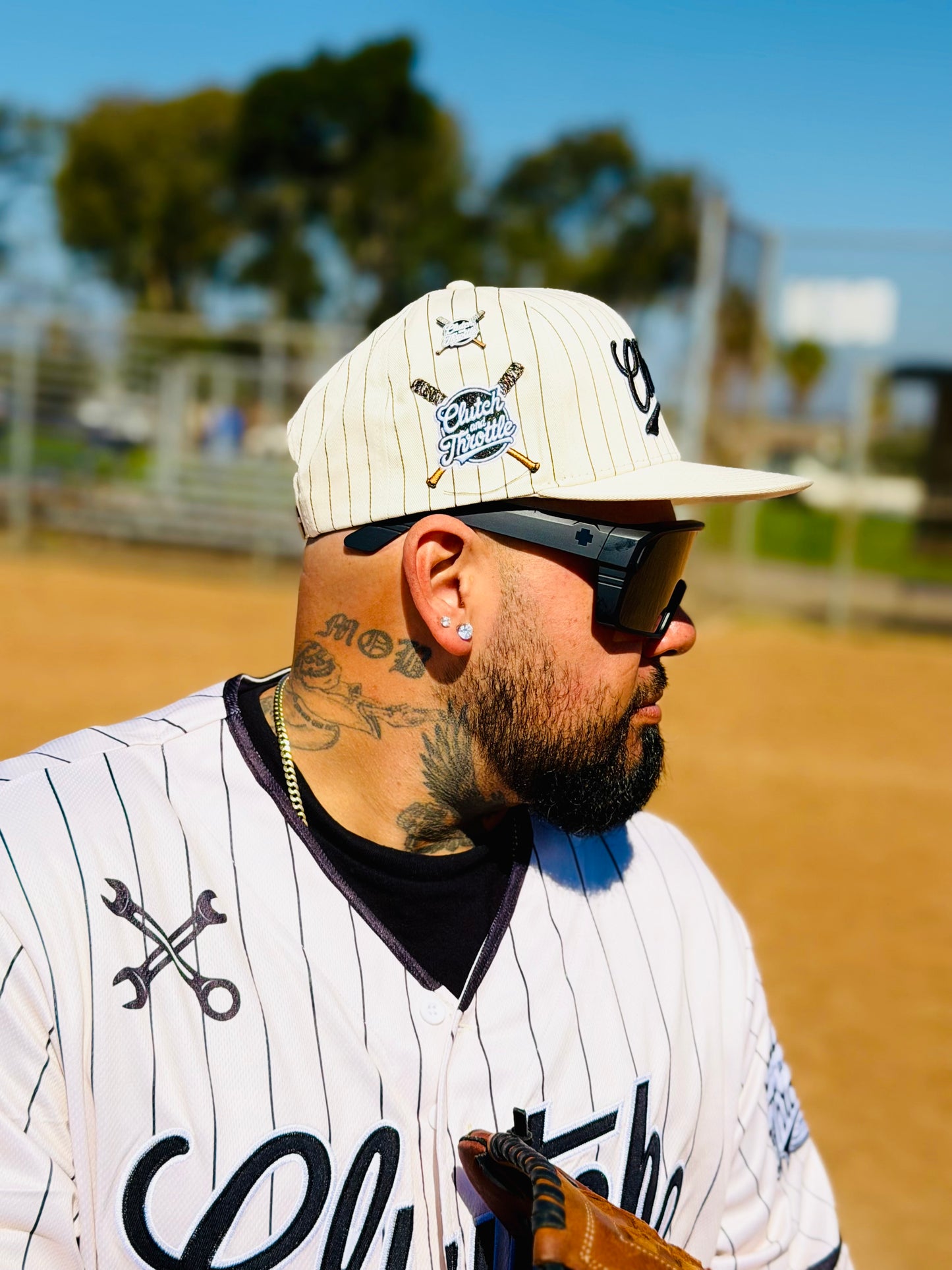 The OG Slugger Pinstriped Baseball Jersey (Off-White/Black)