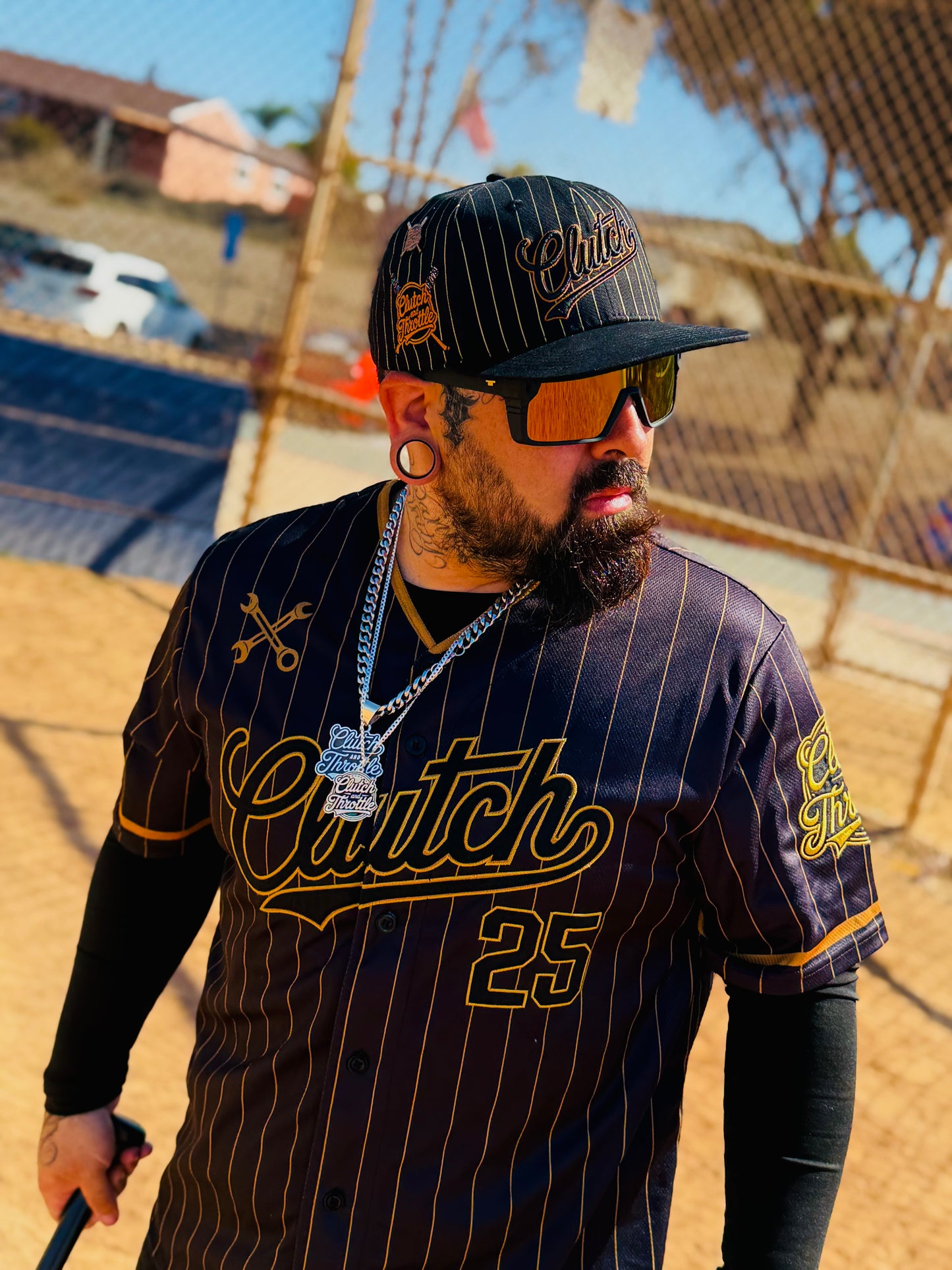 The OG Slugger Pinstriped Baseball Jersey (Black/Gold)