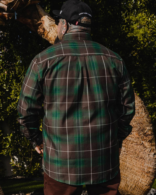 The FOURTH Flannel of the 6 Part Dancun Series, the Twin Palms Flannel features an allover green, brown, and white plaid pattern that offers a clean and classic design, while our signature D-Tech™ blend provides the comfort of soft to the touch flannel. Constructed to be breathable for the performance you demand, yet durable for the rugged lifestyle you live. Brown and green flannel