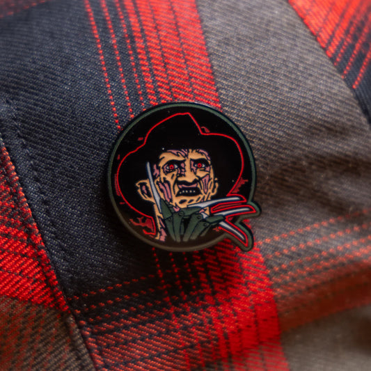 The Springwood Slasher Enamel Cap Pin